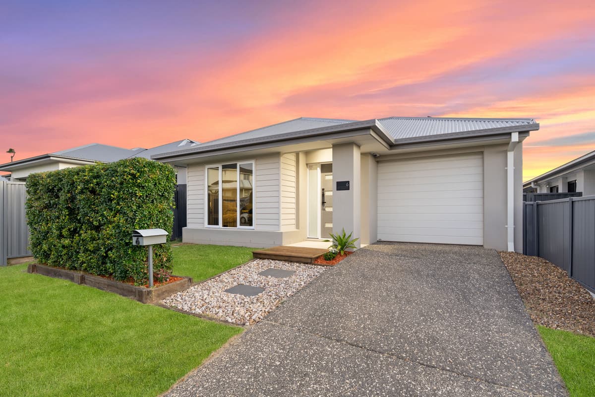 Gorgeous three bedroom near new home with entertainer's deck!