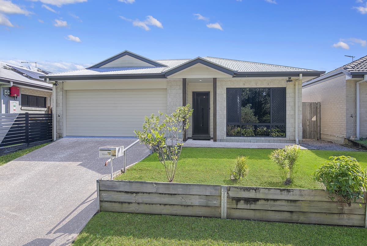 Functional family living with multiple living areas, outdoor entertaining and drive-through garage!