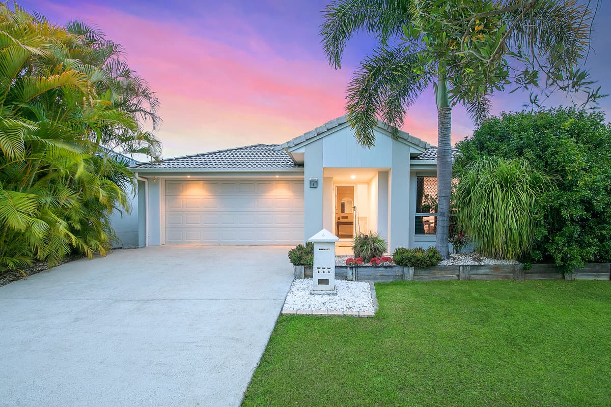 Four-bedroom home with multiple living areas & pool on a great size block!