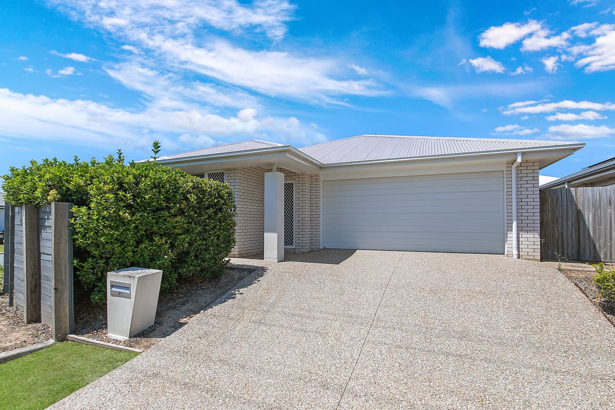 Spacious four-bedroom home with dual living areas with ducted Aircon
