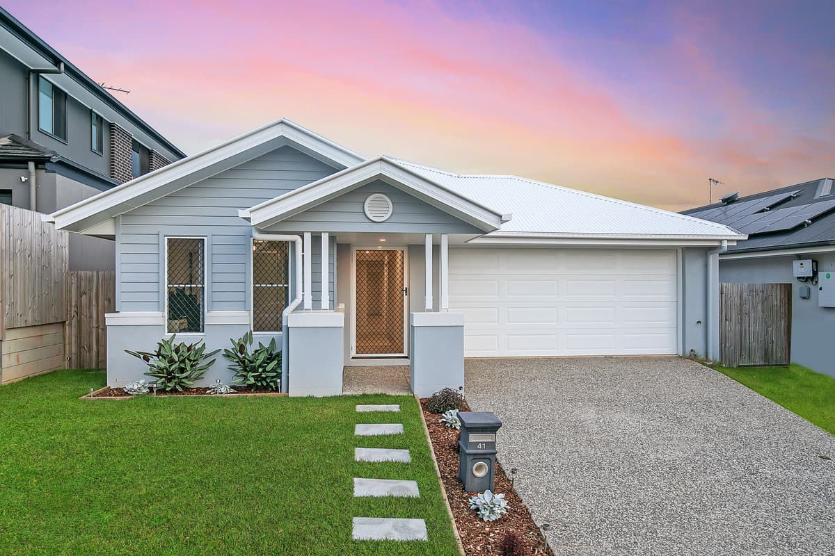 Near new family home with multiple living spaces, ducted air con and in elevated position!
