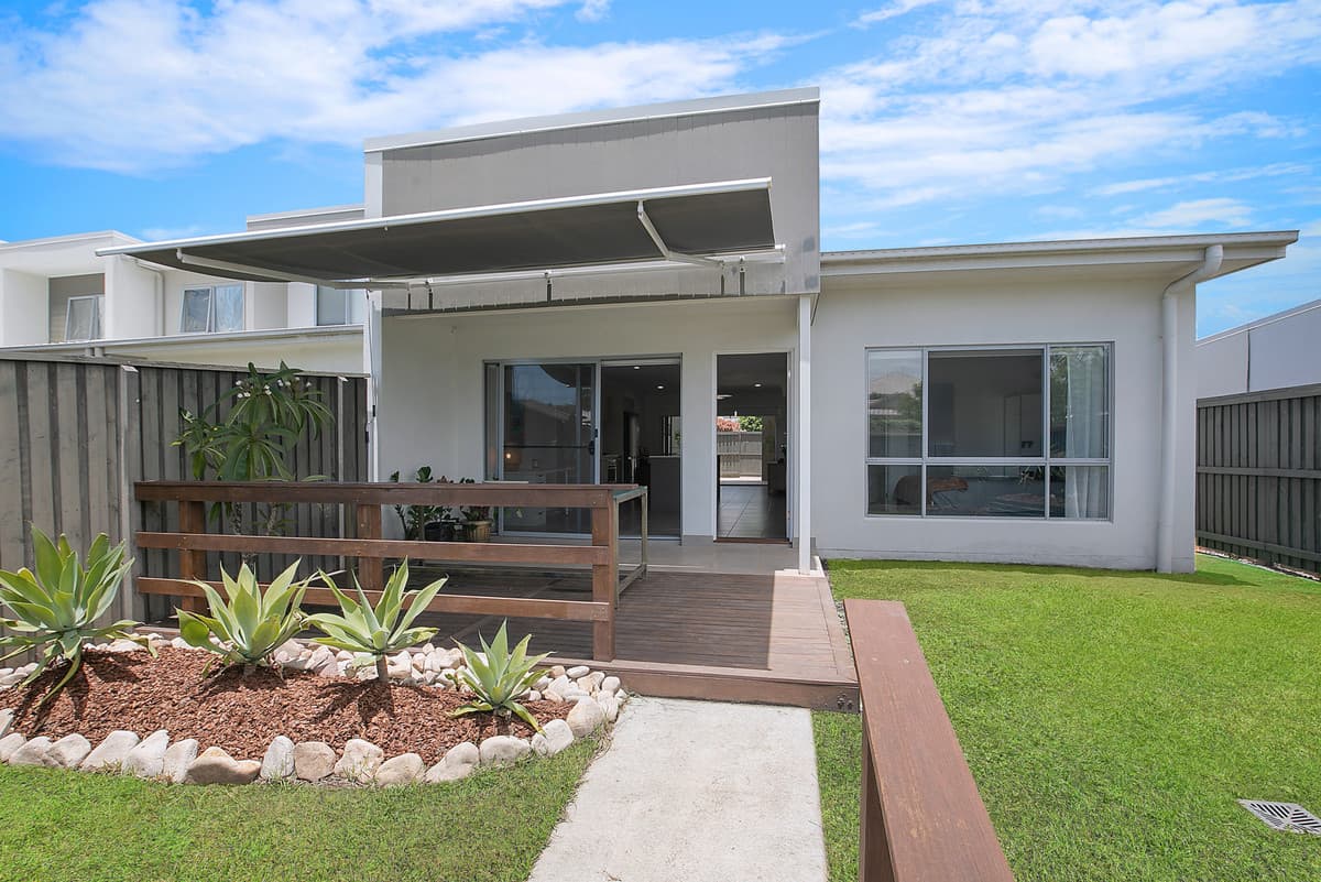 Affordable single level living with lovely yard and double garage!