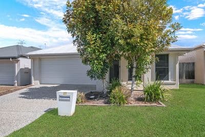 4 Bedroom home, multiple living areas, low maintenance yard!