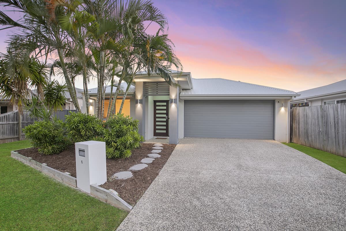4 bedroom family home with bushland outlook, multiple living, solar and side access!