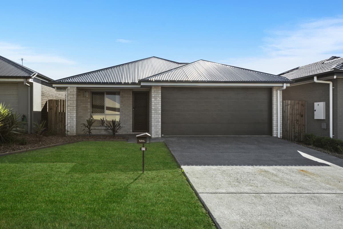 Modern family home with multiple living spaces in a lovely estate close to parks!