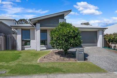 4 Bedroom Family Home With Two Separate Living Areas!