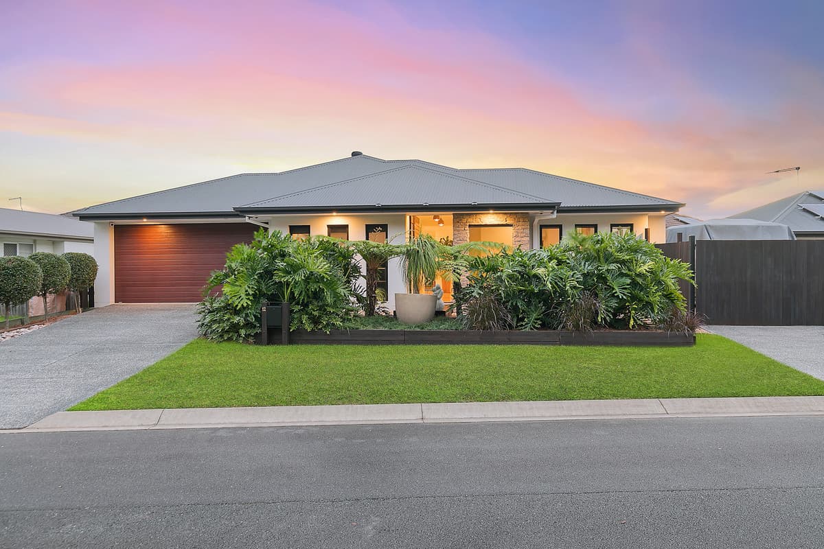 Classy and unique family home with vehicle storage and absolute quality throughout!